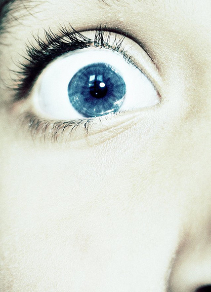 Blue eye expressing fear