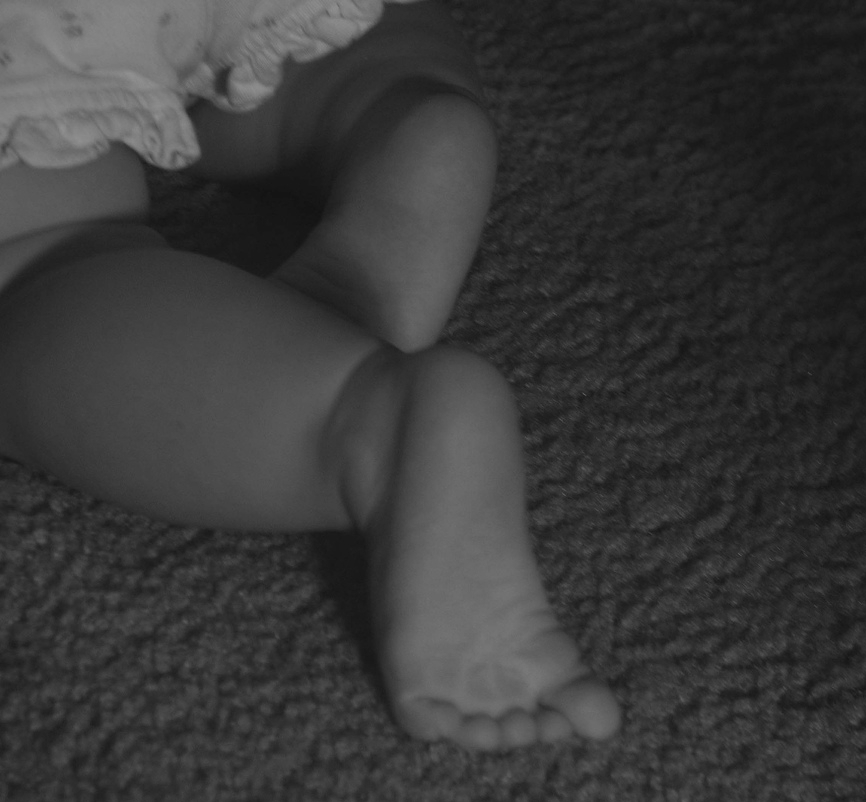 feet of a baby crawling